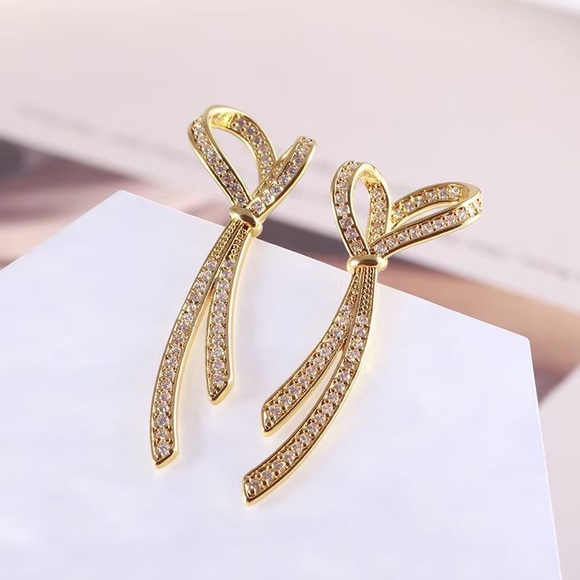 Kate Spade Skinny Bowknot Gold Studs Earrings - Picture 4 of 11